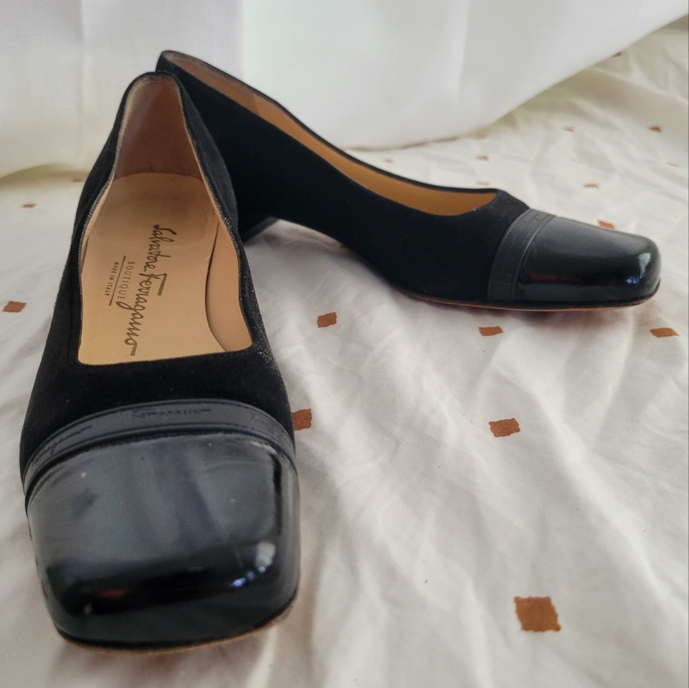Black Salvatore Ferragamo Pumps.
